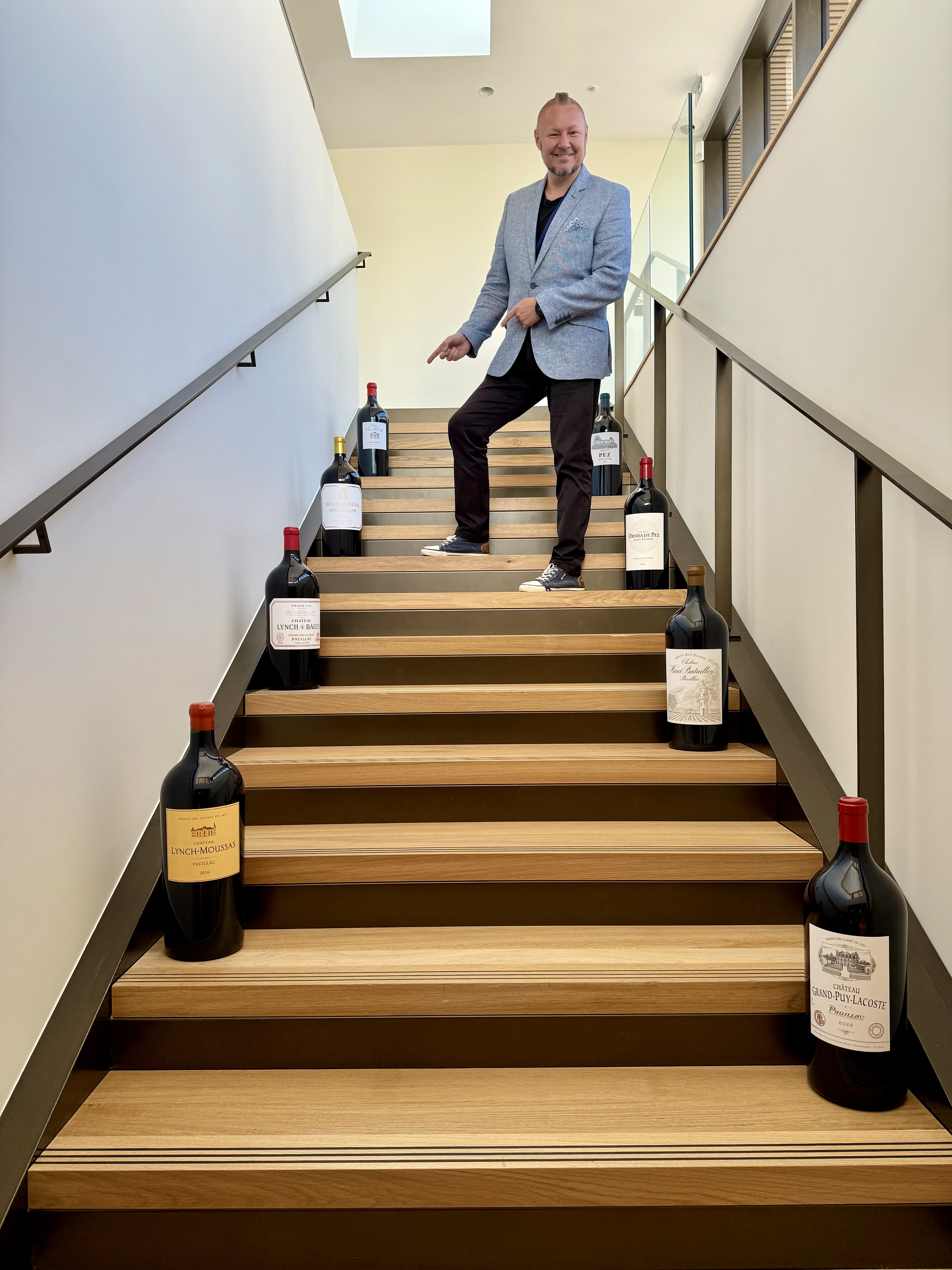 Pavel with bottles on stairs