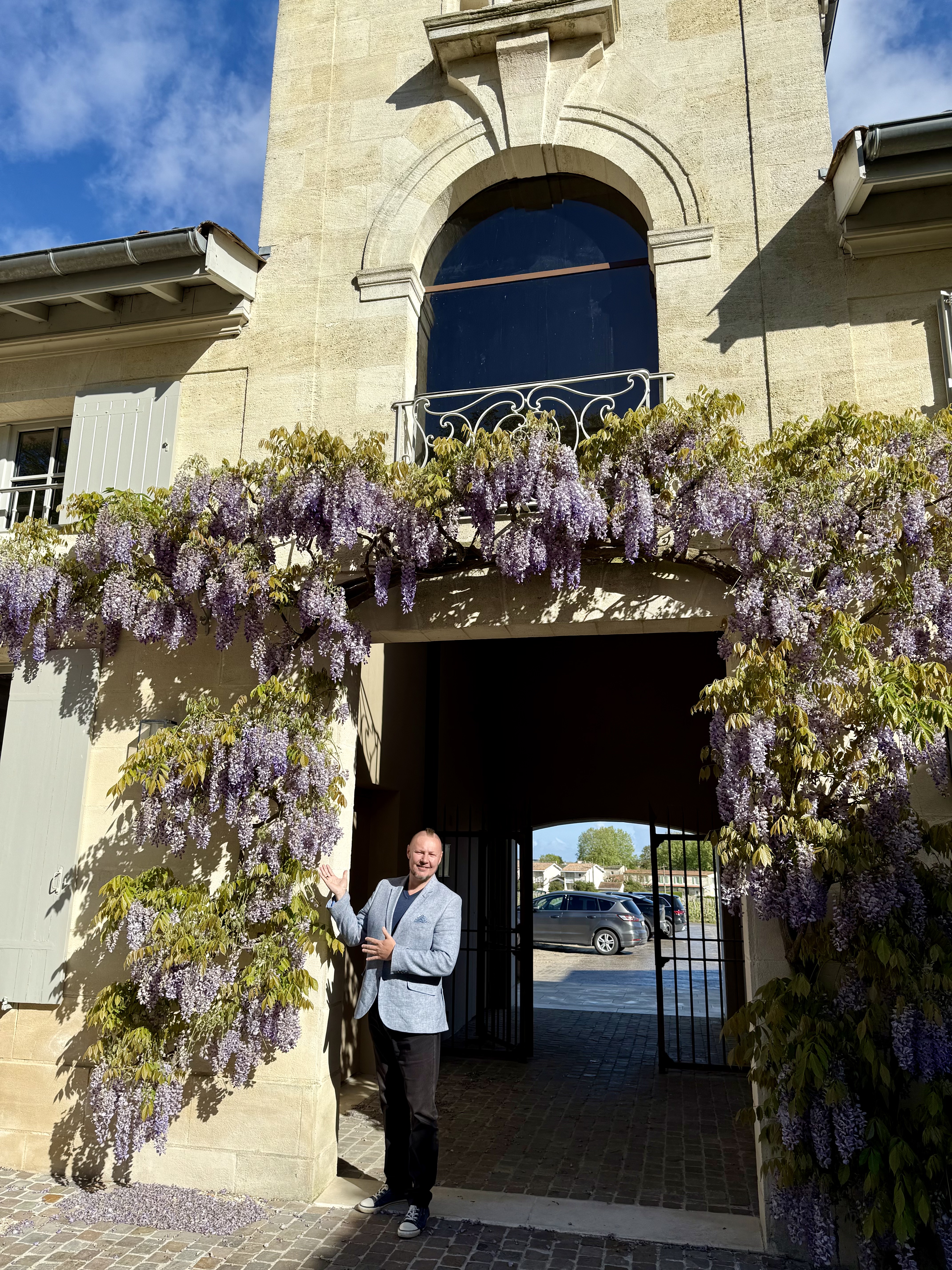 Pavel under wisteria arch